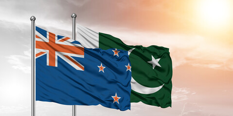 Flags of Pakistan and New Zealand friendship flag waving on the sky with beautiful Background.