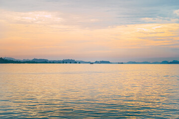 The Sea in The Evening with an Orange Sky Background