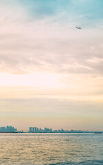 Edge of the state border in the dusk with Singapore in the distance