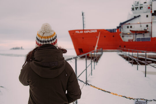 A girl looking at an icebreaker 