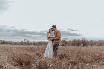 happy couple in the park on a beautiful sunny day