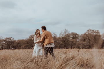 happy couple in the park on a beautiful sunny day