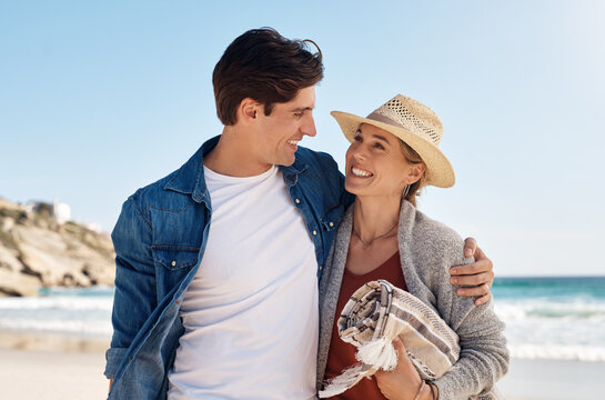 All you nee is sunshine and love. a middle aged couple spending the day at the beach.