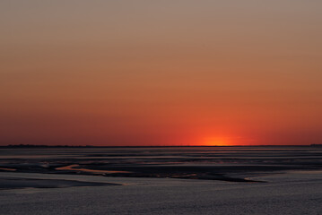 Fototapeta na wymiar Sonnenuntergang im Wattenmeer.