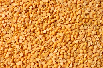 Foto op Plexiglas Dry organic lentils or chana channa dal top view background or texture. Healthy spices, nuts, seeds and herbal products. © Farhan