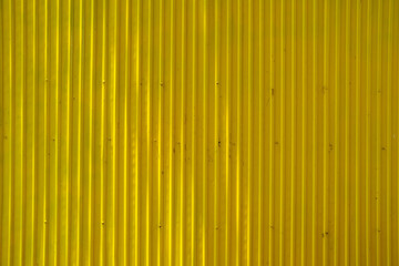 Light Beam on Yellow Paint Old Zinc Wall Background.