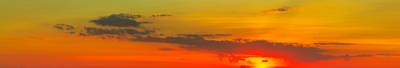 clouds and orange sky,Real amazing panoramic sunrise or sunset sky with gentle colorful clouds. Long panorama, crop it