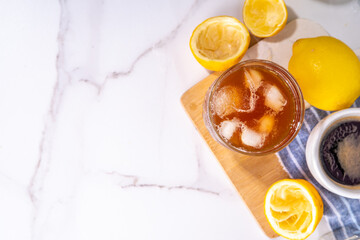 Coffee and lemonade drink, limeade cocktail with lemon juice, espresso and crushed ice.  Trendy coffee mocktail with sour lemon taste tonic 