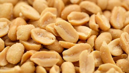 Salted roasted peanuts close up