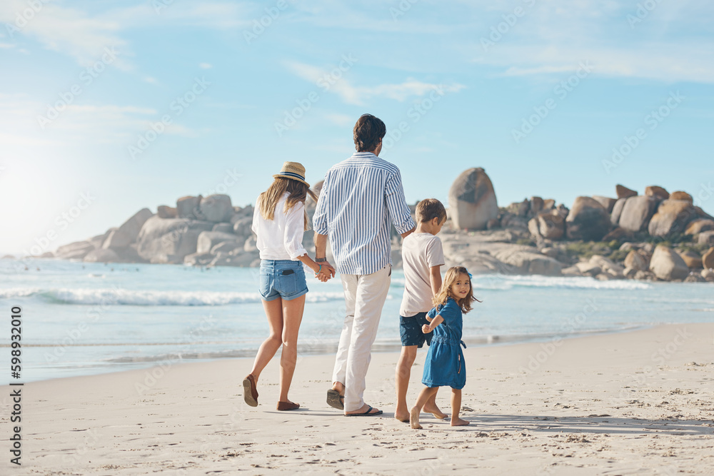 Canvas Prints My family will always protect me. Rearview shot of an unrecognizable couple holding hands with their two young children and walking along the beach.