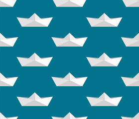 Seamless pattern with paper boats on a blue background. Vector illustration.