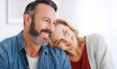 Fototapeta premium Next to you is where I choose to be. an affectionate couple relaxing together at home.