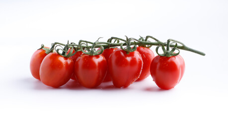 red cherry tomatoes on white background