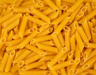 Full frame close up of penne pasta, top view