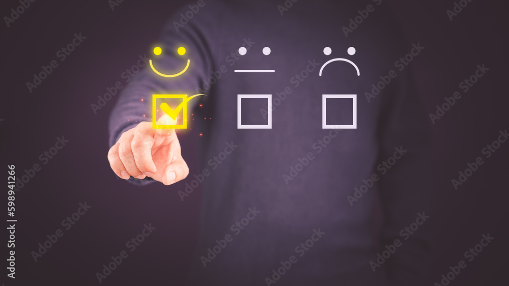 Poster client hand are touching the virtual screen on the happy smile face icon to give satisfaction in ser