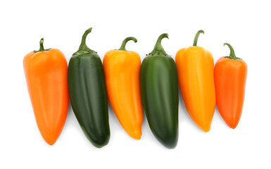 Different hot chili peppers isolated on white, top view