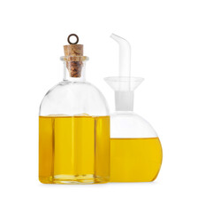 Different glass bottles of cooking oil on white background