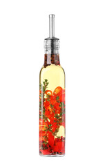 Glass bottle of cooking oil with spices and herbs isolated on white