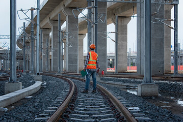 Engineer sitting on railway inspection. construction worker on railways. Engineer work on Railway....