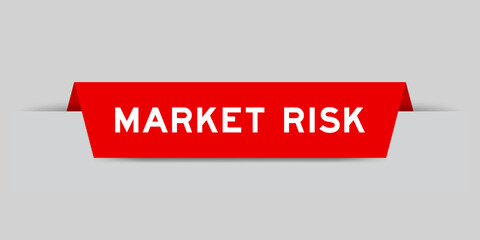 Red color inserted label with word market risk on gray background