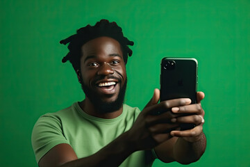 Happy, excited, Shocked, funny American african black man with phone in hands on green background. Generated Ai