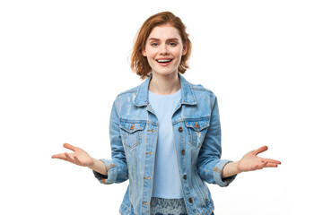 Portrait of happy young redhead woman spreading hands with joy and inspiration. Hands wide open isolated on white studio background