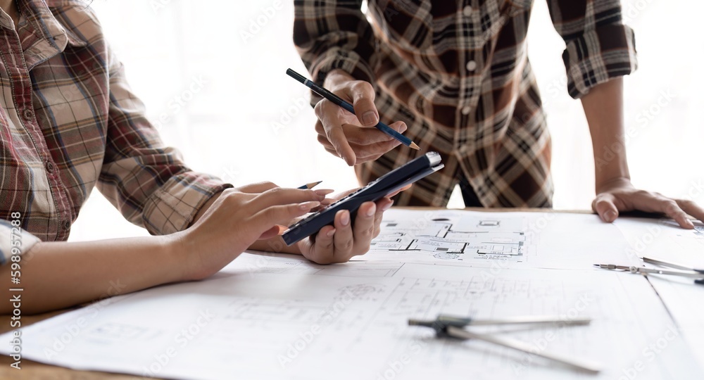Poster image of team engineer and architect discuss for construction blueprints on new project with enginee