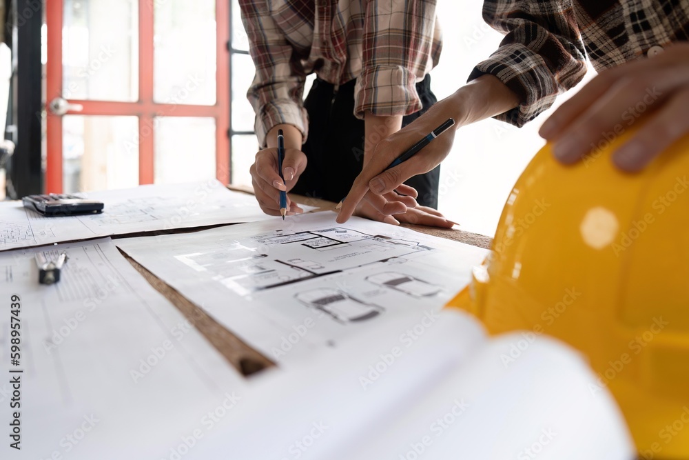 Poster image of team engineer and architect discuss for construction blueprints on new project with enginee