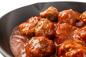 Tomato meatballs on a white background