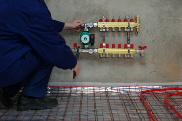 Plumber installing collector and plastic pipes