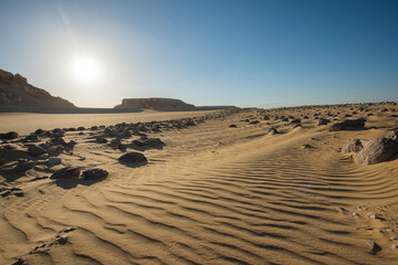 Barren desert landscape in hot climate with geological watermelons