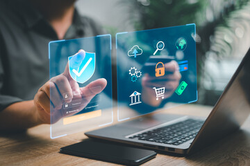 Cybersecurity and privacy data protection concept, Businessman use laptop and credit cards online...