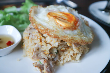 fried rice or stir fried rice with pork and sunny side up egg