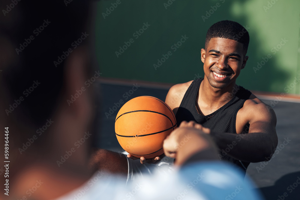 Poster Thanks for the great game. a sporty young man giving his teammate a fist bump on a basketball court.