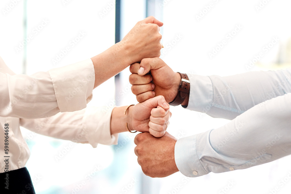 Poster We stack up to some great things. Closeup shot of two unrecognisable businesspeople stacking their fists on top of each other.