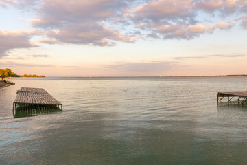 Sunset at Lake Balaton in Hungary, Calm water surface, pretty clouds, Concept, Holiday landscape