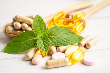 Alternative medicine herbal organic capsule with vitamin E omega 3 fish oil, mineral, drug with...