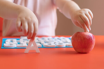 Kids learn to read. Colorful abc  for kindergarten and preschool children. Remote learning and homeschooling for young kid. Child reading sounds and letters. English lesson. 