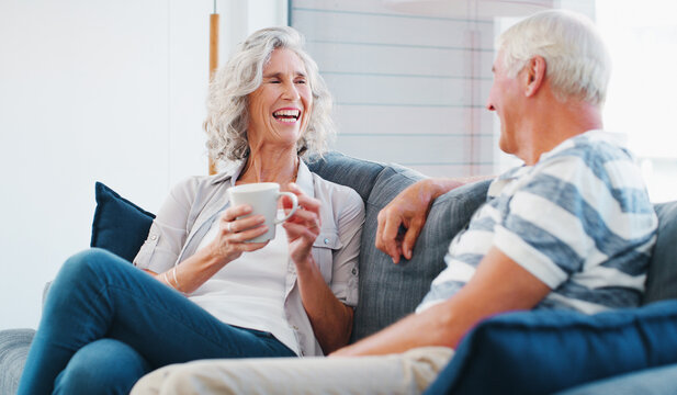 Total relaxation thanks to a good retirement plan. a senior couple enjoying a relaxing coffee break on the sofa at home.