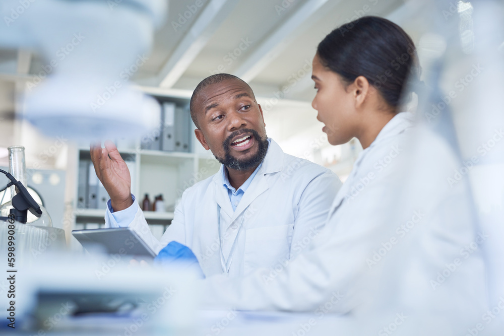 Poster Carrying through experiments in order to broaden scientific knowledge. two scientists having a discussion in a lab.