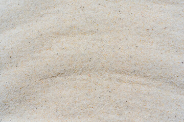 White sand background, macro close up of white sand or abstract white sand wave texture.