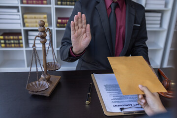 Corruption and Bribery,Businessman manager refusing receive money from Business man passing money...