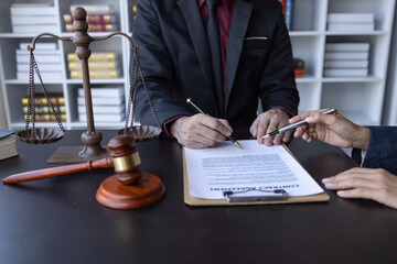 Consultation of Businesswoman Private office of a young Asian lawyer working on financial...