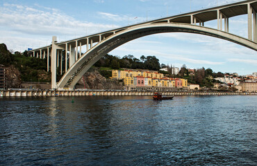 Fototapeta na wymiar One of the bridges over the Douro River in the city of Porto, Portugal