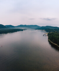 Aerial view on Teletskoye lake in Altai mountains, Siberia, Russia. Drone shot. Beauty summer day.