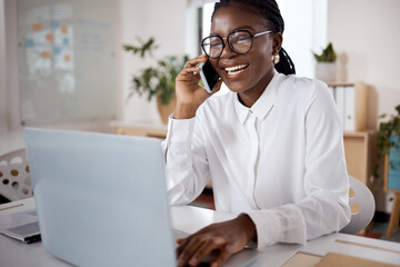 Let me update you on the situation. a young businesswoman using a laptop and smartphone in a modern office.