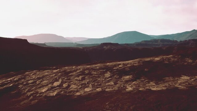 black volcanic basalt rock formations in the low light