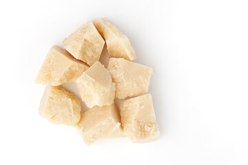 pieces of parmesan cheese isolated on white