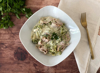 Italian Art broccoli al forno with ham, Gorgonzola and cream.