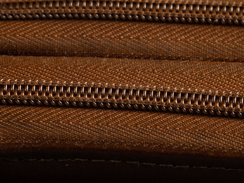 Close up large format file of a zipper from a wallet